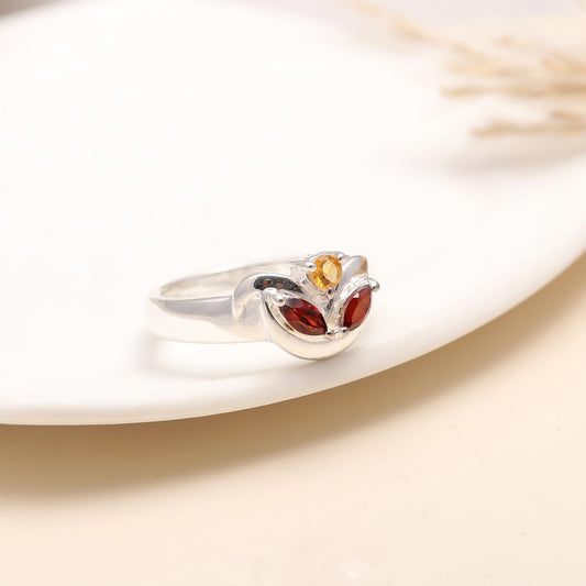 Close-up of the 925 Silver Garnet Ring with a deep red garnet gemstone.